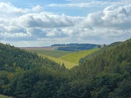 Rolling hills next to pod