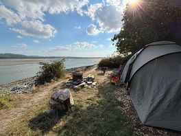 Late afternoon sunshine over the estuary