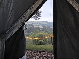In the evening, our view from the tent, with the fairy lights on.