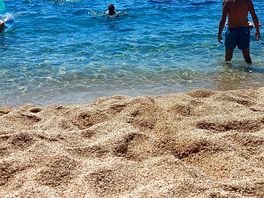 Crystal waters, febals beach is better amd quieter than the main beach.
