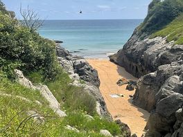 Coastal walk past lighthouse.