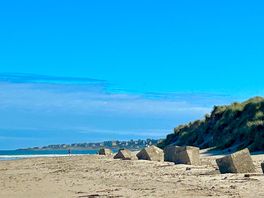 Beautiful scenery beach next to site.