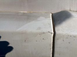 Damaged bumper due to poor lighting at night