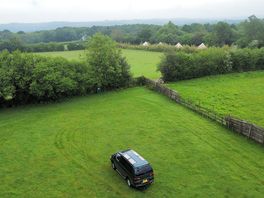 Mitsubishi delica in the campsite overlooking the countryside
