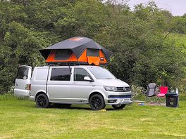 Our vw transporter and tentbox on a grass pitch