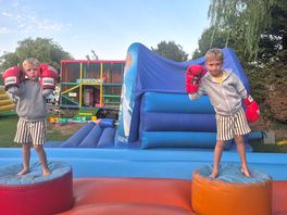 Inflatables and soft play i'm the background.