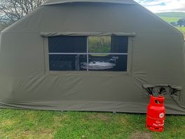 Back view of tent with air vents at the top of front and back walls.