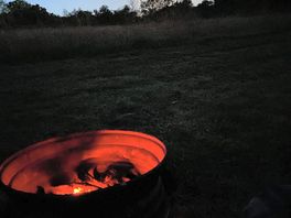 Moonrise with campfire
