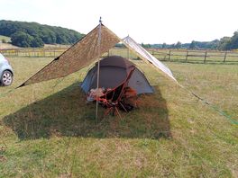 Car parked by tent