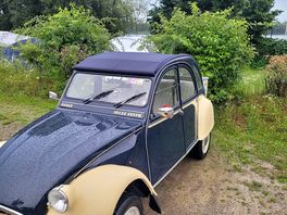 My car parked nearish to tent