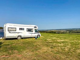 Motorhome pitched on the grass