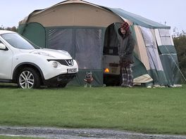 Our tailer tent set up with awning.