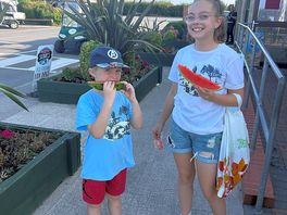 Enjoying a slice of watermelon from the on site shop
