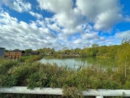 Overlooking the lake from the gravel pitch