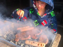 Concrete slab for disposable barbecue. child chef not included.
