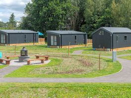 Glamping cabins and the communal firepit