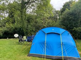Our pitch alongside the river