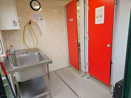 Washing up area, toilet and shower.