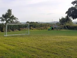 Small play area adjacent to the camping field