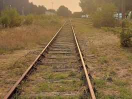 Old railway track put the front of the site which you can walk over to supermarket.