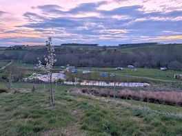 The site viewed from the barn at the top of the hill