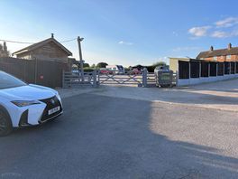 Entrance to site off pub car park
