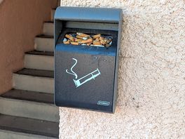 Overflowing cigarette bins.