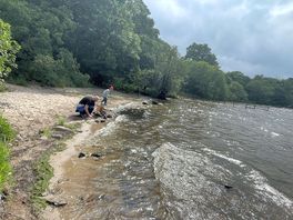 Enjoying skimming stones.