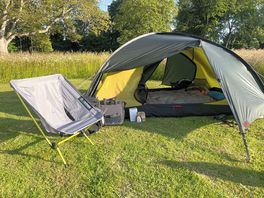 Large pitch with beautifully maintained grass surrounded by wild flower meadow