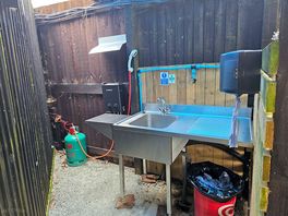 Washing area with hot water