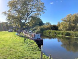 View of the river wissey which runs through the camp