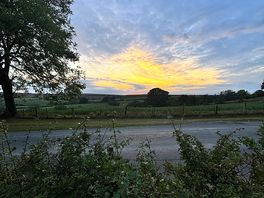 Sunset in a moody sky