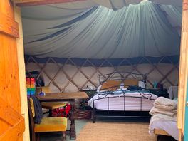 The interior of the yurt from the doorway.