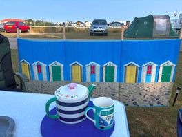 Morning view with a cuppa on brown field