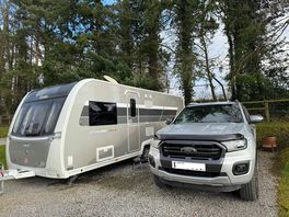 Large gravel pitches offered use of fire pit but van has heating