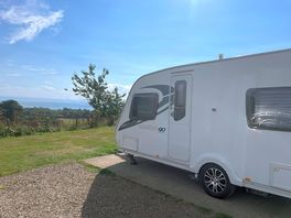 Caravan, pitch and view.