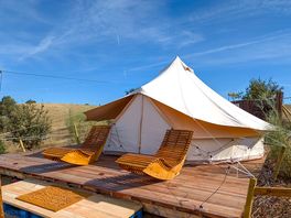 Terrace seating outside the bell tent