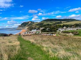 View of golden cap beach and pub from a view from outback to the top of hill