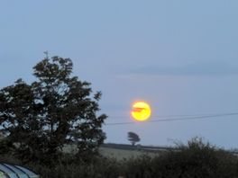 The moon, looking inland