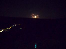 Moon rising over the hill. unfortunately my phone could not show the beautiful starry sky.