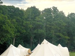 The stunning tents, warm and cozy, built on wood, amazing view of sunsets.