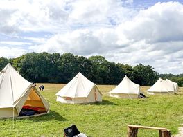 Empty bell tents in a line