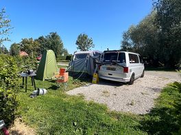 Our chosen pitch hardstanding and grass nice boundary and electricity