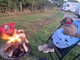 Round the camp fire.