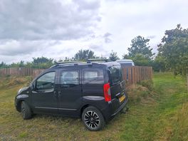 Car parking next to tent part