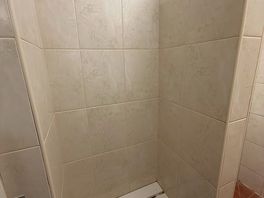 The changing area within the shower room