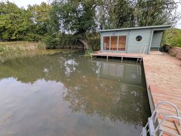 Another view of the swimming pond and sauna