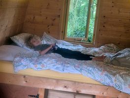 My son enjoying the lovely comfy bed in the pod