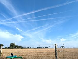 Photo from the bell tent looking across open fields.