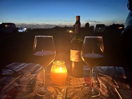 It’s a hard life! great sitting out enjoying our wine .